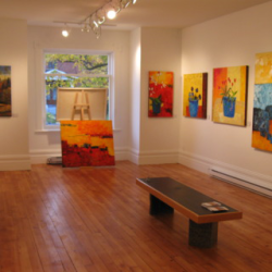 Bright paintings in Inside an art galerie