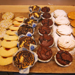 Variety of pastries presented in four rows.