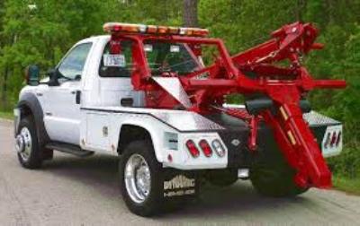 White and red towing truck