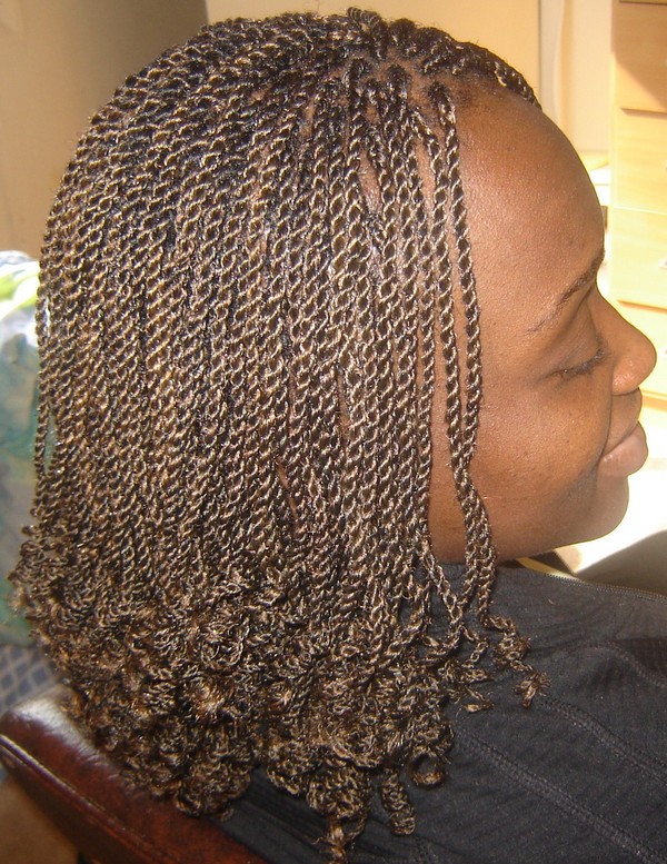 Young woman showing an amazing braid hairdo